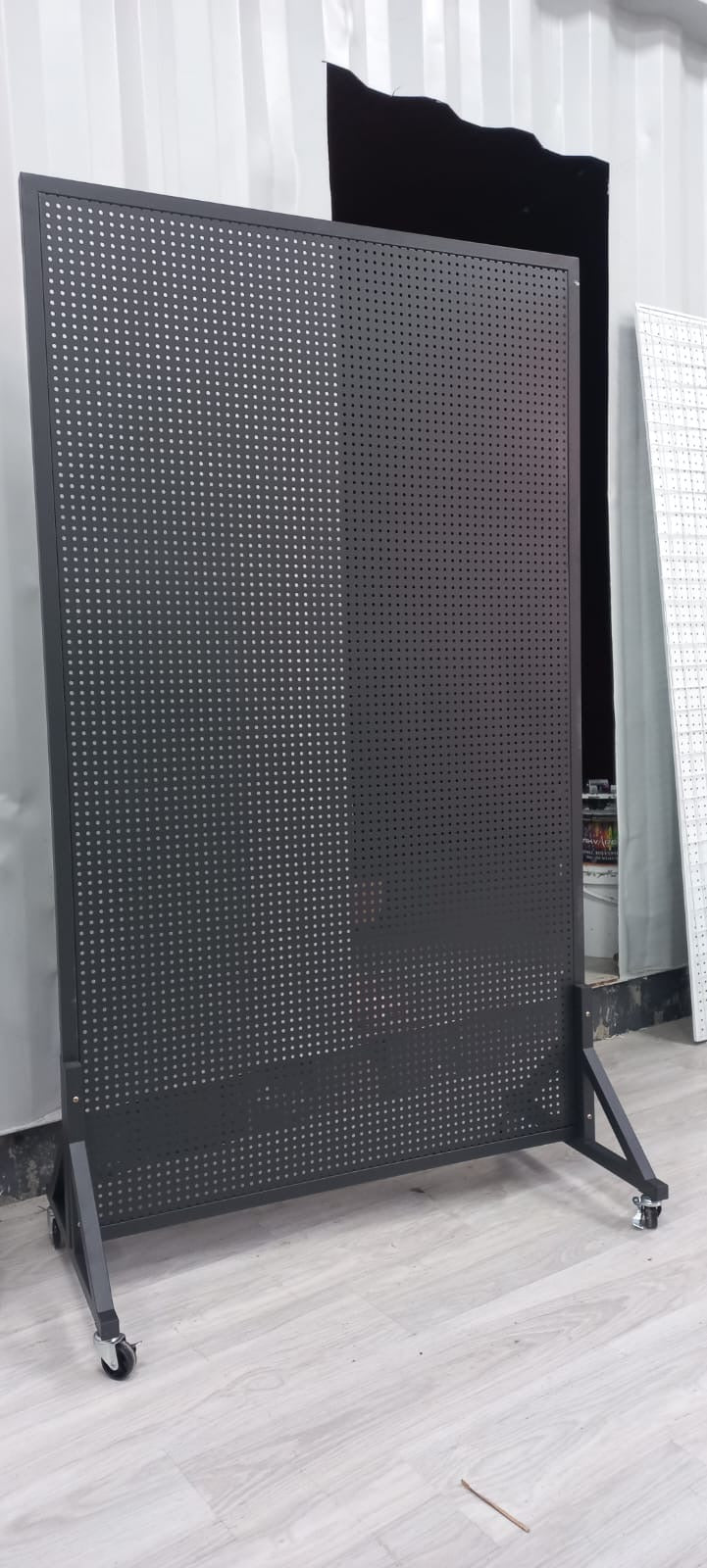 Perforated wall for hanging products with wheels